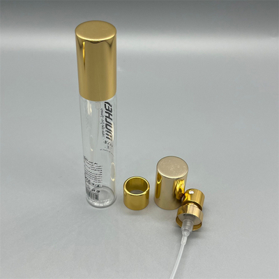 Bouteille de parfum dorée de luxe pompe à parfum